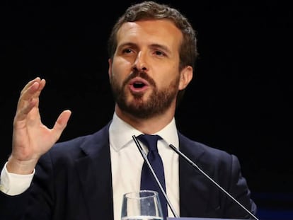 FILE PHOTO: Spain's People's Party (PP) leader Pablo Casado attends a campaign closing rally ahead of general election, in Madrid