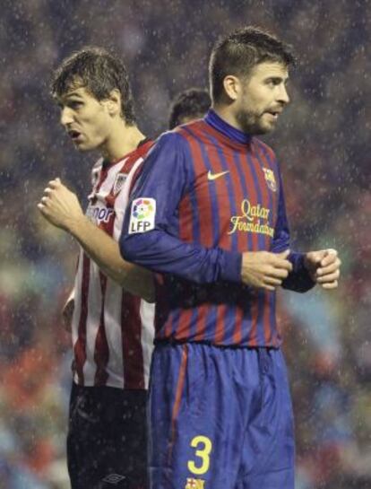 Llorente y Piqué, en el partido de Liga jugado en noviembre de 2011 en San Mamés.