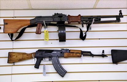 Assault style weapons are displayed for sale at Capitol City Arms Supply