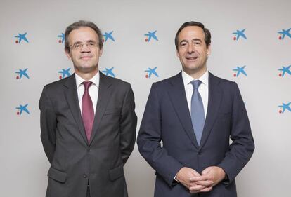 Jordi Gual, presidente de CaixaBank, y Gonzalo Gortázar, consejero delegado