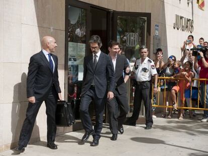 Messi leaves court after appearing before a judge over tax fraud allegations in September 2013.