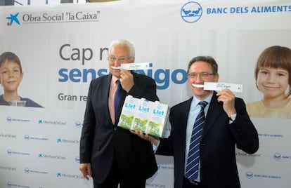 El president del Banc d’Aliments de Barcelona, Eduard Arruga, i el director general de la Fundació la Caixa, Jaume Giró.