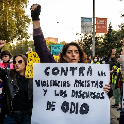 MADRID, SPAIN - 2021/11/13: A woman protesting with a placard reading 'against racist violence and hate speech' during a demonstration against racism. The annual march called by the Madrid Anti-racist Assembly has passed through the center of the capital against institutional racism and police brutality, remembering all those migrant people who have died due to racism in Spain coinciding with the anniversary of the murder of the Dominican Lucrecia Perez, recognized as the first racist hate crime in Spain, on November 13, 1992. (Photo by Marcos del Mazo/LightRocket via Getty Images)