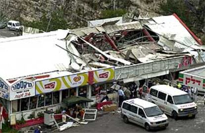 Imagen del restaurante destruido por el atentado suicida de Haifa.