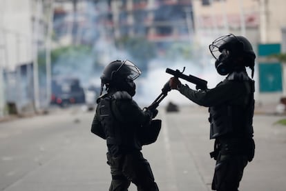 Riot police during a day of protests, in Panama City, on October 24.