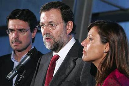 Rajoy, junto al presidente del PP de Canarias, José Manuel Soria, y la presidenta del partido en Tenerife, Cristina Tavío.