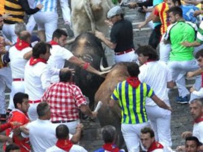 Una carrera de Daniel Úbeda, con gorra.