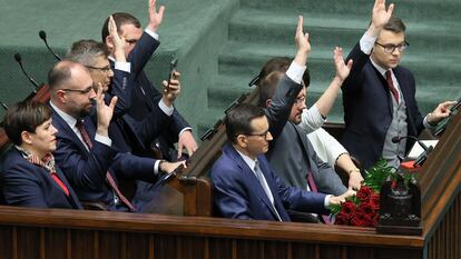 Members of the Polish Law and Justice government vote of confidence on Mateusz Morawiecki's (C) government at the Sejm, the lower house of parliament, in Warsaw, Poland, 11 December 2023.
