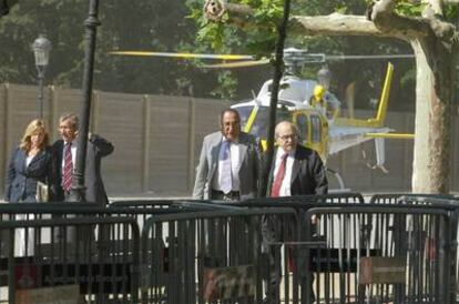 Catalan Socialist leader Joaquim Nadal and regional economic chief, Andreu Mas-Colell, arriving at the parlaiment building by helicopter.