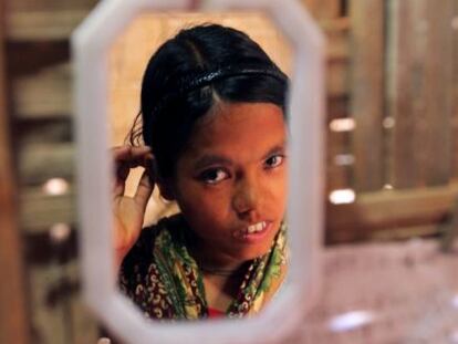 Nilima, uma menina de Bangladesh de 14 anos.