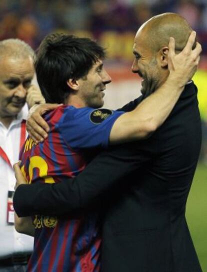 Guardiola y Messi celebran el triunfo en la Copa.