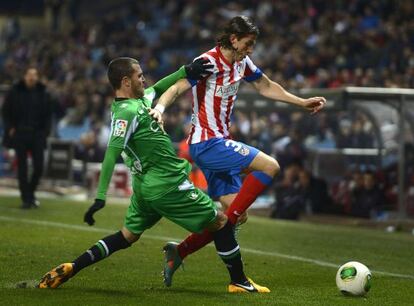 Chica y Filipe Luis en el partido de ida.