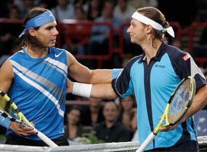 Nadal felicita a Nalbandian tras el partido