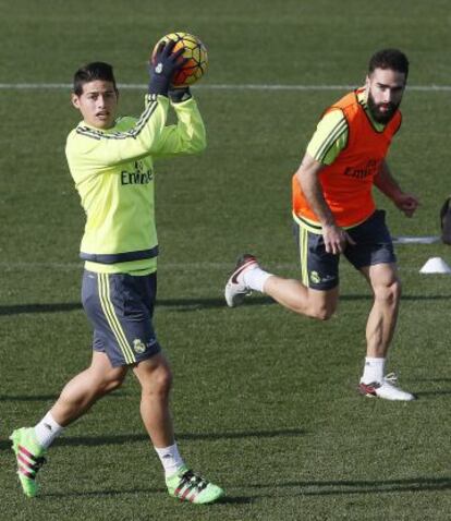 James, junto a Carvajal, este sábado en Valdebebas.