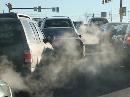 Polluting clouds of exhaust fumes rise in the air Denver Colorado