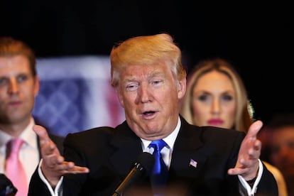 Republican presidential front runner Donald Trump speaks to supporters at Trump Tower in Manhattan.