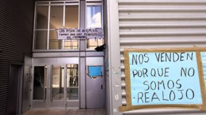 Residents protesting the sale of their homes.