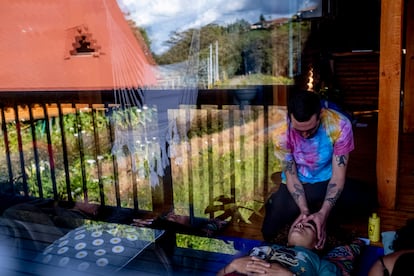 Therapists and clients gather at a healing center in Colombia to ingesting psilocybin mushrooms, listen to music, and participate in group therapy. Santa Elena, Antioquia, Colombia, June 25, 2022.