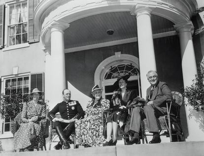 (Original Caption) Hyde Park, New York: Norwegian Royalty Guests Of President Roosevelt. Mrs. Roosevelt, Crown Prince Olav of Norway, Sara Delano Roosevelt, the President's mother; Crown Princess Martha and President Roosevelt, (from left to right), are shown seated on a porch of the Roosevelt home at Hyde Park, April 30th, as the Norwegian Royalty were guests of the President and First Lady.