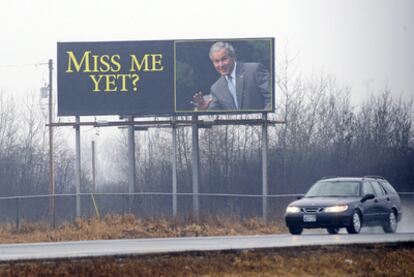 Cartel publicitario en el estado de Minnesota con la imagen de George W. Bush