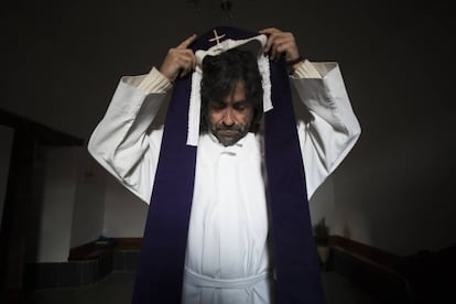 Father Teo Nieto prepares for one of the 624 masses he holds each year.