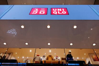 FILE PHOTO: A shopper looks on, inside a Fast Retailing's Uniqlo casual clothing store in Tokyo, Japan January 11, 2023. REUTERS/Issei Kato/File Photo