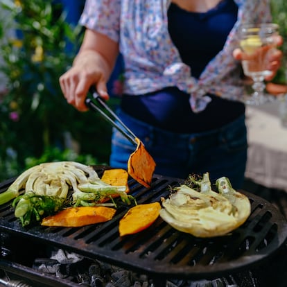 Close up of vegetables cooking on barbecue.