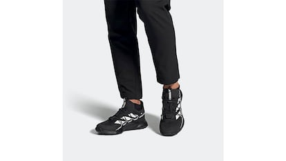 Adidas hiking shoes on a white background.