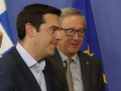 Alexis Tsipras e Jean-Claude Juncker, nesta quarta-feira em Bruxelas.