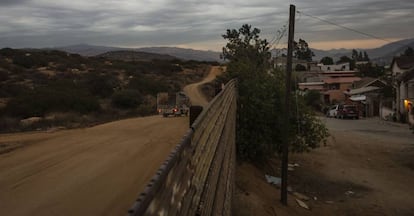 The fence at the border town of Tecate. On the left, Mexico.