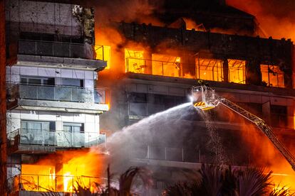 Firefighters trying to put out the fire in the building on Thursday.