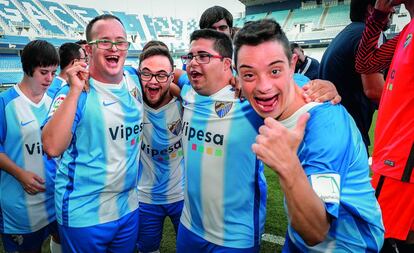 Los jugadores del Málaga Genuine celebrando un partido.