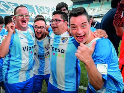 Los jugadores del Málaga Genuine celebrando un partido.