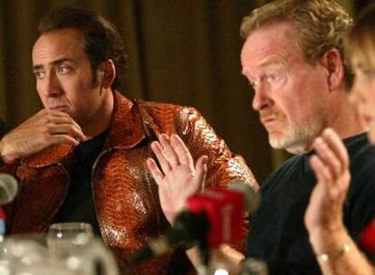 A la izquierda, el actor Nicolas Cage; a su lado, Ridley Scott.