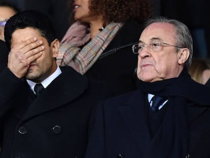 O presidente do PSG, Nasser Al-Khelaifi, cobre o rosto ao lado de Florentino Pérez.