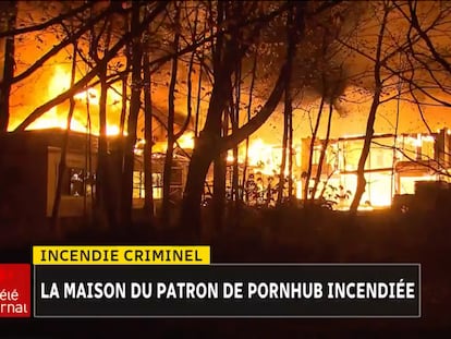 Una imagen de la televisora local que captó el incendio que destruyó la mansión del empresario de Pornhub, Feras Antoon