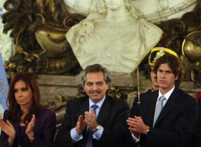 Cristina Fernández, el jefe de Gabinete Alberto Fernández (centro) y Martín Lousteau, en marzo pasado.