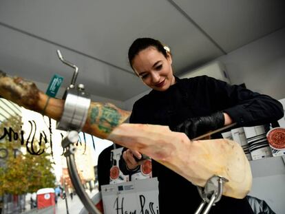 Ham carvers are highly sought after in Spain. Pictured, the specialist Raquel Acosta.