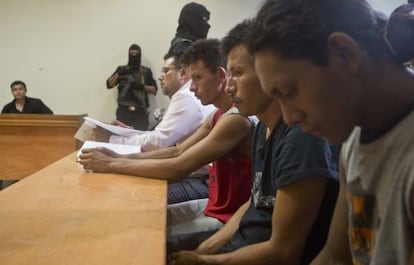 Three men arrested for their alleged participation in the massacre.