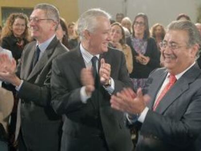 Gallardón, Arenas y Zoido, en el acto de esta mañana con mujeres del PP.