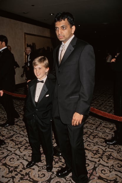 'The Sixth Sense' star Haley Joel Osment with the film's director and screenwriter M. Night Shyamalan in March 2000.