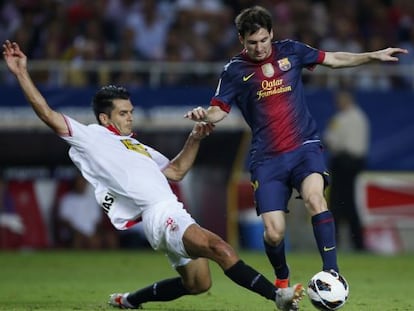 Emir Spahic entra a Messi.