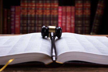 Open Law Book And Mallet