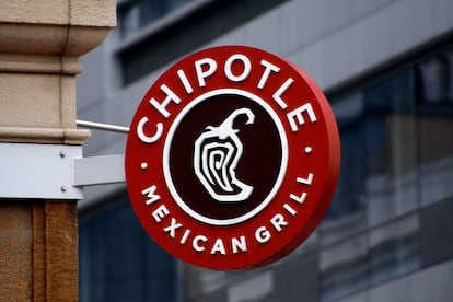 FILE - A sign for the Chipotle restaurant in Pittsburgh's Market Square is pictured Feb. 8, 2016. Restaurants are beginning the new year with a recurring problem: labor shortages. Chipotle said Thursday, Jan. 26, 2023, that it is looking to hire 15,000 people in North America to ensure its stores are staffed up ahead of its busy spring season. (AP Photo/Keith Srakocic, File)