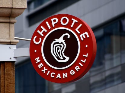 FILE - A sign for the Chipotle restaurant in Pittsburgh's Market Square is pictured Feb. 8, 2016. Restaurants are beginning the new year with a recurring problem: labor shortages. Chipotle said Thursday, Jan. 26, 2023, that it is looking to hire 15,000 people in North America to ensure its stores are staffed up ahead of its busy spring season. (AP Photo/Keith Srakocic, File)
