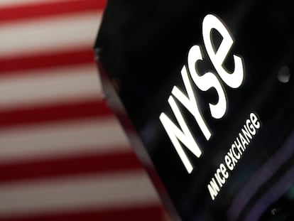 An NYSE sign is seen on the floor at the New York Stock Exchange in New York, Wednesday, February 22, 2023.