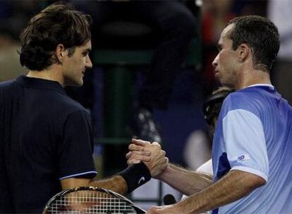 Federer y Stepanek al final del encuentro