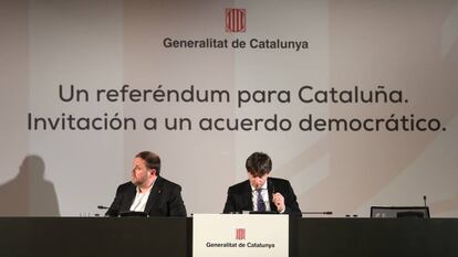 Puigdemont y Junqueras en la conferencia "Un referéndum para Cataluña" que tuvo lugar en el Ayuntamiento de Madrid.