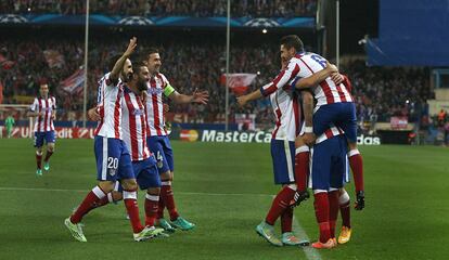 Koke, Juanfran, Arda y Gabi celebran un gol ante el Olympiacos durante el partido de Liga de Campeones.