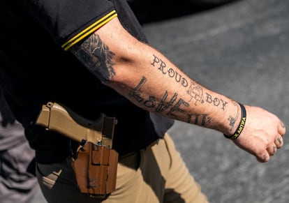 A member of the Proud Boys walks in front of the Tennessee State Capitol ahead of a special session on public safety in Nashville, Tennessee, U.S. August 21,2023.